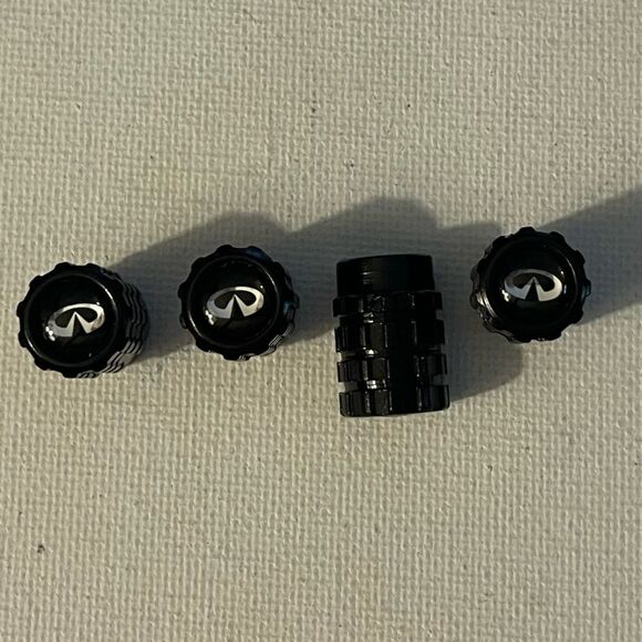 Infinity valve Stem caps in black set of 4 NWT - Picture 1 of 4
